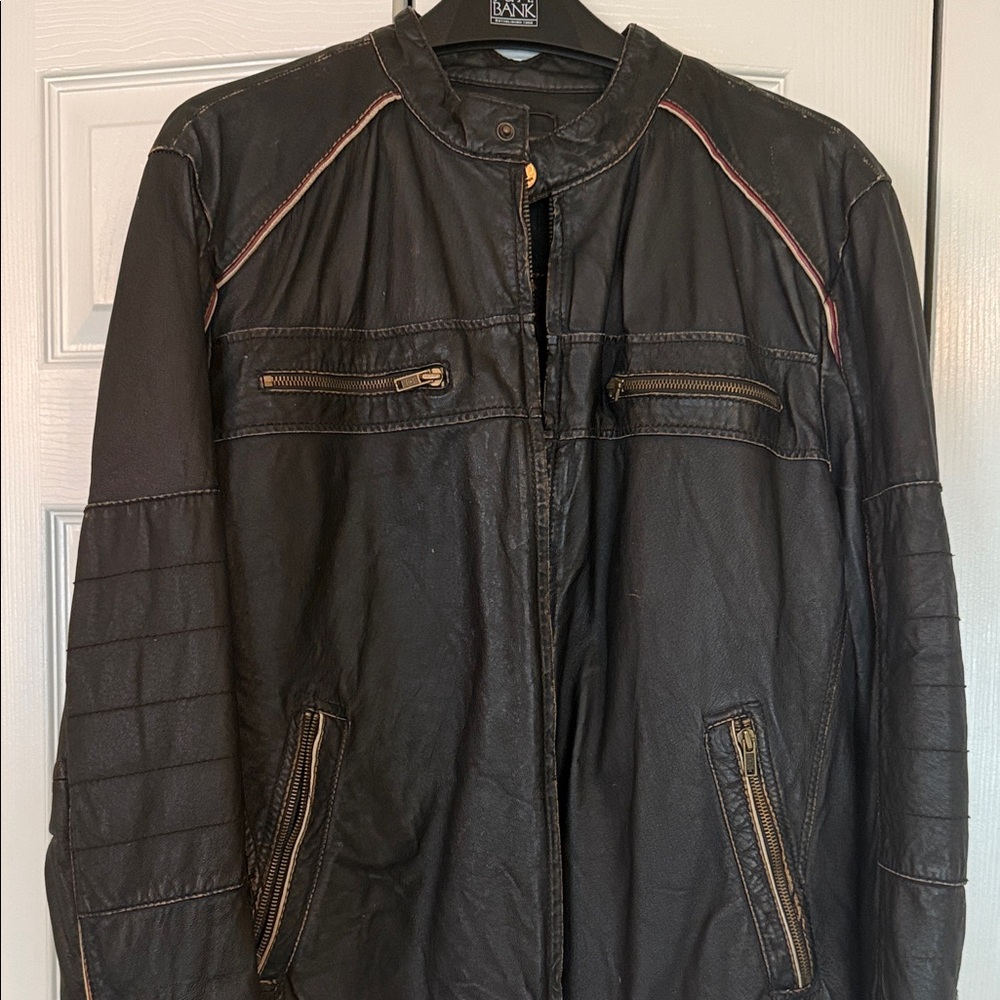 Wilson Black Leather Jacket with red and white lStitching. New condition